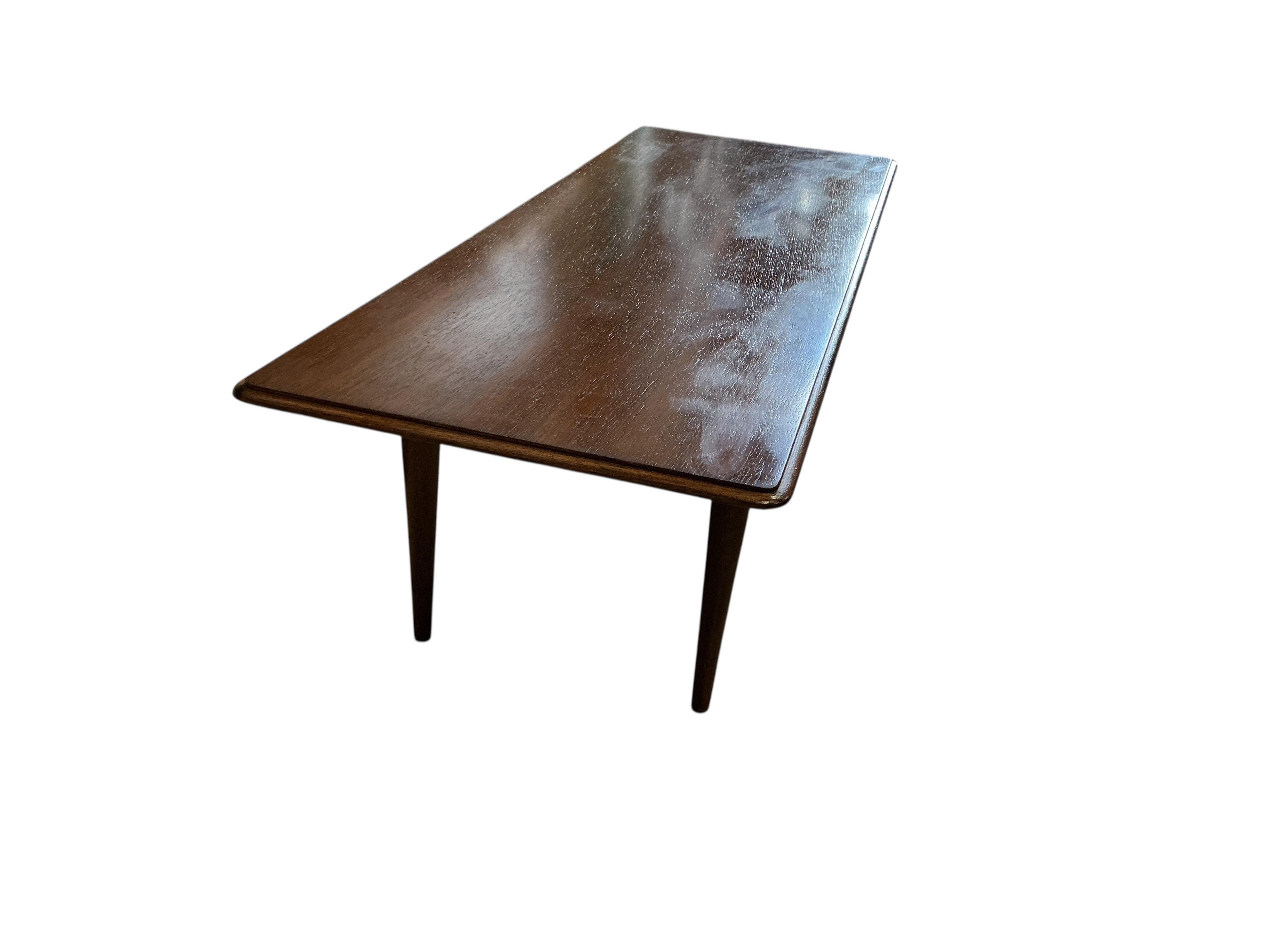 A mid century Archie Shine rectangular teak coffee table, width 118cm, depth 45cm, height 38cm